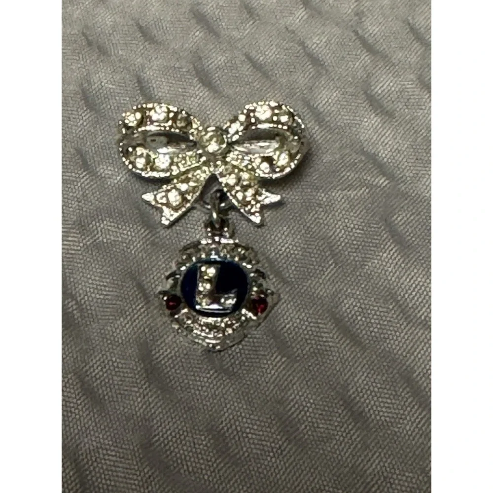 VTG. LIONS INTERNATIONAL BEAUTIFUL RHINESTONE BOW FRATERNAL CLUB DANGLE PIN ORA